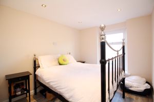 Bedroom One- click for photo gallery